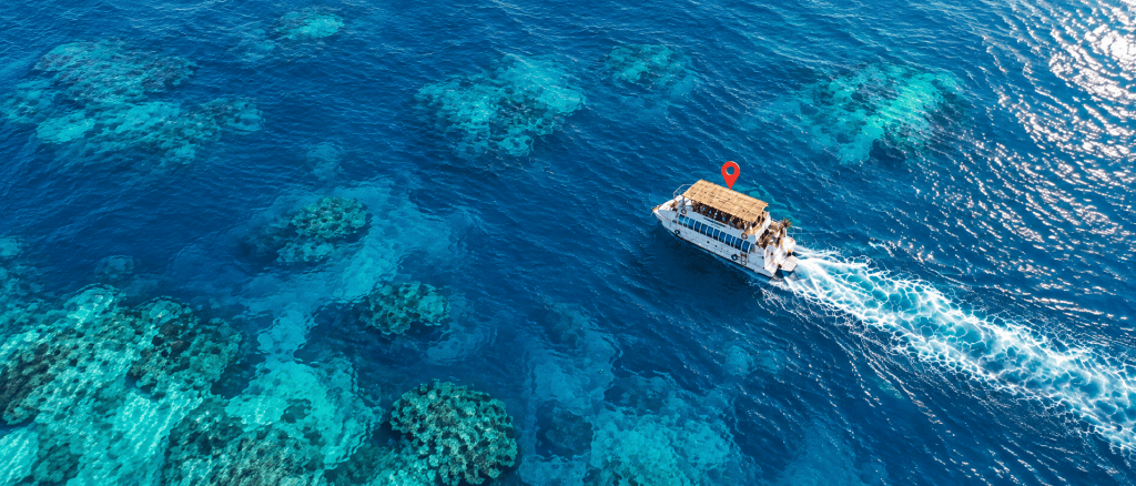 Aerial view of a floating bar on turquoise water inspired by Tecate Light’s Gulf of Mexico Bar campaign
